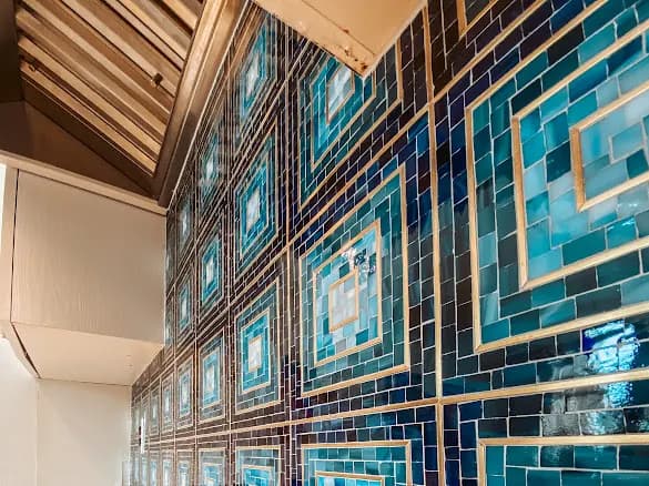 Blue and gold mosaic feature wall